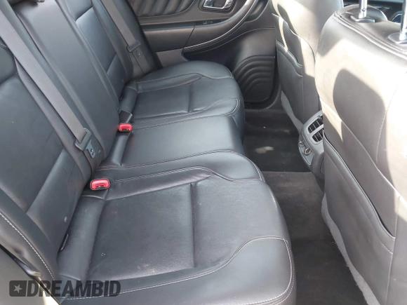 2015 Ford Taurus SEL with VIN 1FAHP2E85FG174242, listed as a IAAI auction lot 42407291 with 108,852 mi miles and . Bid and sale history available at DreamBid. Image 8.