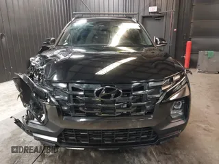 2023 Hyundai Santa Cruz Night Edition z VIN 5NTJCDAF0PH059683, wystawiony jako IAAI lot #42075765 z przebiegiem 25 077 mil mil oraz . Historia ofert i sprzedaży dostępna na DreamBid. Obrazek 13.
