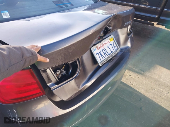 2012 BMW 3 Series 328i with VIN WBA3C1C56CF430938, listed as a IAAI auction lot 41749278 with Not provided miles and . Bid and sale history available at DreamBid. Image 12.