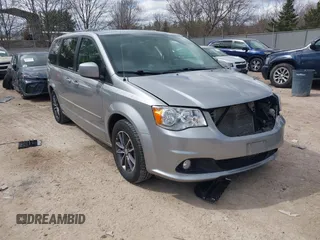 2017 Dodge Grand Caravan SXT with VIN 2C4RDGCG6HR671199, listed as a IAAI auction lot 42031157 with 99,189 mi miles and . Bid and sale history available at DreamBid. Image 1.