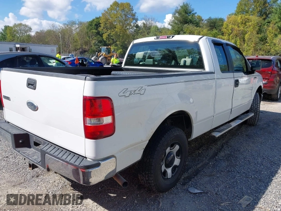 2007 Ford F-150 STX with VIN 1FTRX14W87FA14579, listed as a IAAI auction lot 40503694 with 164,718 mi miles. Bid and sale history available at carsss.com. Image 4.