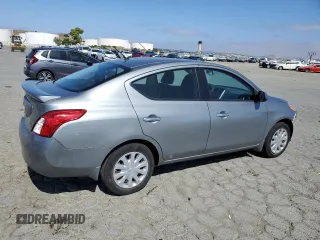 2013 Nissan Versa SV with VIN 3N1CN7AP2DL853742, listed as a Copart auction lot 60462615 with 75,587 mi miles and Salvage title. Bid and sale history available at DreamBid. Image 3.