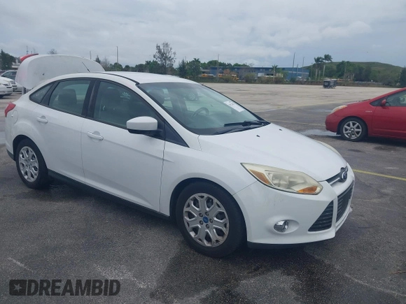 2012 Ford Focus SE with VIN 1FAHP3F25CL239383, listed as a IAAI auction lot 41656033 with 127,011 mi miles and . Bid and sale history available at DreamBid. Image 1.