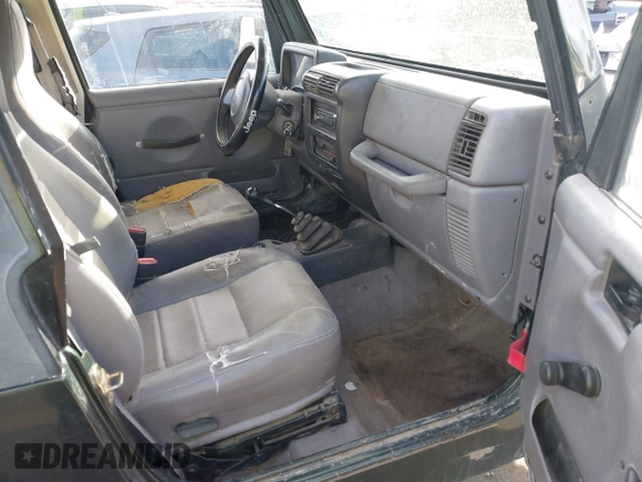 1998 Jeep Wrangler SE with VIN 1J4FY29P1WP760687, listed as a IAAI auction lot 41720889 with 210,592 mi miles. Bid and sale history available at carsss.com. Image 5.