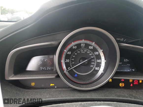 2016 Mazda 3 i Touring with VIN JM1BM1W71G1285237, listed as a Copart auction lot 71208844 with 94,534 mi miles and Salvage Title. Bid and sale history available at DreamBid. Image 9.