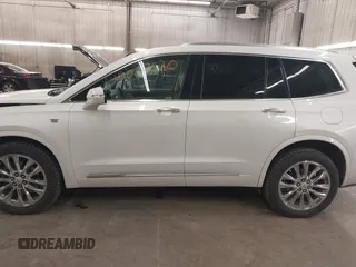 2022 Cadillac XT6 Premium Luxury with VIN 1GYKPDRS3NZ131095, listed as a IAAI auction lot 42087620 with 36,740 mi miles and . Bid and sale history available at DreamBid. Image 15.