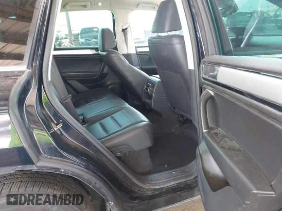 2016 Volkswagen Touareg Sport with VIN WVGEF9BP0GD012148, listed as a IAAI auction lot 42195030 with 95,984 mi miles and . Bid and sale history available at DreamBid. Image 8.