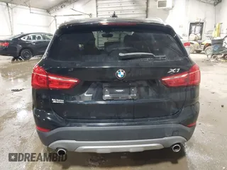 2018 BMW X1 xDrive28i with VIN WBXHT3C30J5K29383, listed as a IAAI auction lot 41503314 with 107,678 mi miles. Bid and sale history available at carsss.com. Image 16.