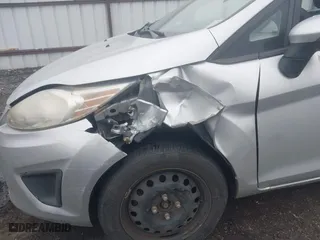 2013 Ford Fiesta SE with VIN 3FADP4BJ3DM176706, listed as a IAAI auction lot 42047063 with 126,799 mi miles. Bid and sale history available at carsss.com. Image 6.