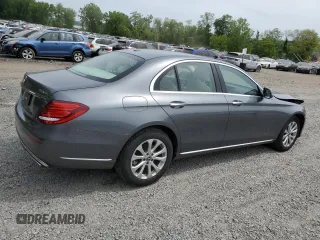 2018 Mercedes-Benz E 300 with VIN WDDZF4KBXJA337966, listed as a Copart auction lot 58718355 with 54,264 mi miles and Salvage title. Bid and sale history available at DreamBid. Image 3.