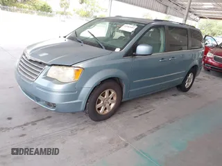 2009 Chrysler Town & Country Touring with VIN 2A8HR54119R584798, listed as a IAAI auction lot 42183484 with 174,871 mi miles and . Bid and sale history available at DreamBid. Image 2.