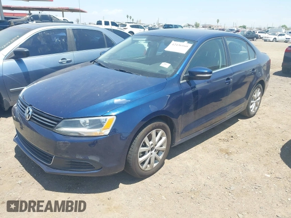 2014 Volkswagen Jetta SE z VIN 3VWD17AJ1EM303577, wystawiony jako IAAI lot #42436160 z przebiegiem 113 086 mil mil oraz . Historia ofert i sprzedaży dostępna na DreamBid. Obrazek 2.
