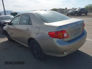 2010 Toyota Corolla with VIN 1NXBU4EE7AZ258059, listed as a IAAI auction lot 41603509 with 183,645 mi miles and . Bid and sale history available at DreamBid. Image 3.