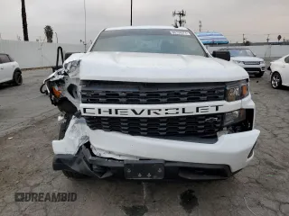 2021 Chevrolet Silverado 1500 Custom with VIN 1GCRWBEH9MZ122437, listed as a Copart auction lot 86158574 with 31,865 mi miles and Salvage Title. Bid and sale history available at DreamBid. Image 5.