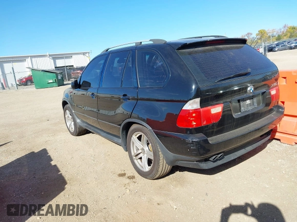 2001 BMW X5 4.4i with VIN WBAFB33581LH08039, listed as a IAAI auction lot 40679627 with 1 mi miles. Bid and sale history available at carsss.com. Image 3.
