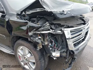 2015 Chevrolet Suburban LTZ with VIN 1GNSCKKC6FR271675, listed as a IAAI auction lot 41915036 with 150,917 mi miles. Bid and sale history available at carsss.com. Image 6.
