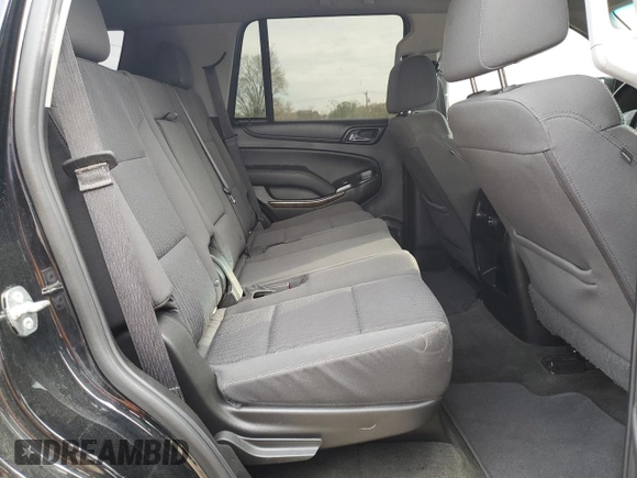 2018 Chevrolet Tahoe LS z VIN 1GNSKAKC8JR215839, wystawiony jako Copart lot #52627955 z przebiegiem 96 380 mil mil oraz Szkoda całkowita • Salvage title. Historia ofert i sprzedaży dostępna na DreamBid. Obrazek 11.