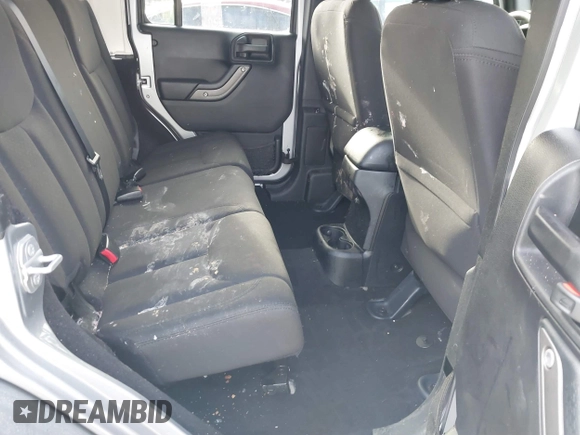 2014 Jeep Wrangler Unlimited Sport with VIN 1C4BJWDG8EL314792, listed as a IAAI auction lot 41489203 with 94,382 mi miles. Bid and sale history available at carsss.com. Image 8.