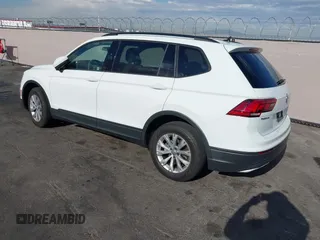 2020 Volkswagen Tiguan S with VIN 3VV1B7AXXLM036994, listed as a IAAI auction lot 42643035 with 62,676 mi miles and . Bid and sale history available at DreamBid. Image 3.
