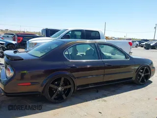 2003 Nissan Maxima SE z VIN JN1DA31D33T512777, wystawiony jako IAAI lot #42005942 z przebiegiem 205 745 mil mil oraz . Historia ofert i sprzedaży dostępna na DreamBid. Obrazek 13.