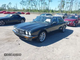 2000 Jaguar XJ with VIN SAJDA15B2YMF14634, listed as a IAAI auction lot 41827953 with 111,505 mi miles and . Bid and sale history available at DreamBid. Image 2.