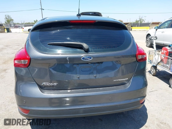 2018 Ford Focus Titanium with VIN 1FADP3N28JL232120, listed as a IAAI auction lot 42544070 with 28,661 mi miles and . Bid and sale history available at DreamBid. Image 17.