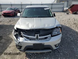 2014 Dodge Journey R/T with VIN 3C4PDCEG3ET276533, listed as a Copart auction lot 50359055 with 121,251 mi miles and Salvage title. Bid and sale history available at DreamBid. Image 5.