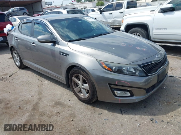 2015 Kia Optima LX with VIN 5XXGM4A71FG423232, listed as a IAAI auction lot 42054131 with 135,213 mi miles. Bid and sale history available at carsss.com. Image 1.