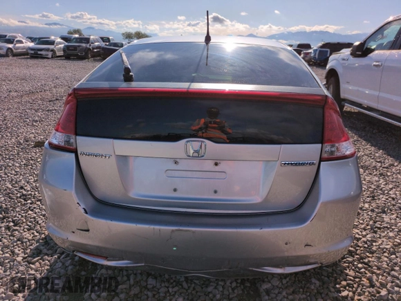 2010 Honda Insight LX with VIN JHMZE2H51AS011243, listed as a Copart auction lot 54445555 with 224,722 mi miles and Salvage Title. Bid and sale history available at DreamBid. Image 6.