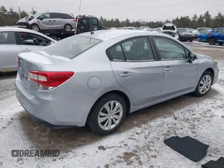 2019 Subaru Impreza with VIN 4S3GKAA60K3601427, listed as a IAAI auction lot 41845403 with 59,373 mi miles and . Bid and sale history available at DreamBid. Image 4.
