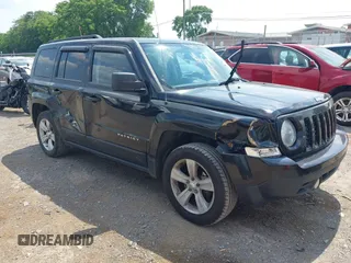 2014 Jeep Patriot Latitude with VIN 1C4NJPFB0ED666201, listed as a IAAI auction lot 42318449 with 123,454 mi miles and . Bid and sale history available at DreamBid. Image 1.