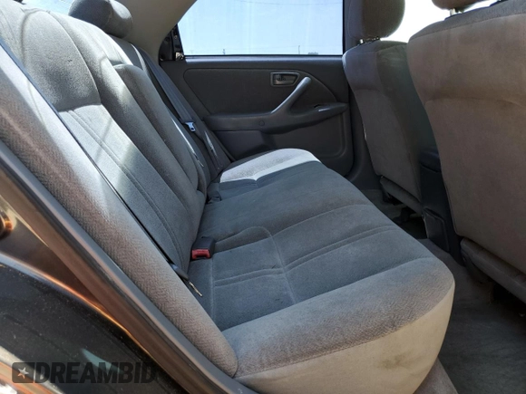 2001 Toyota Camry CE z VIN 4T1BG22K81U783489, wystawiony jako Copart lot #57893115 z przebiegiem 154 352 mil mil oraz Czysty tytuł • Clean title. Historia ofert i sprzedaży dostępna na DreamBid. Obrazek 10.