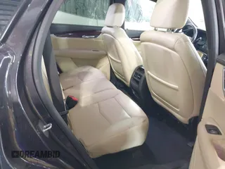 2019 Cadillac XT5 Luxury FWD with VIN 1GYKNCRS6KZ123035, listed as a IAAI auction lot 41588690 with 82,365 mi miles and . Bid and sale history available at DreamBid. Image 8.