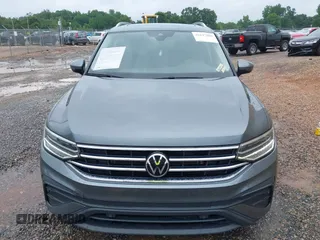 2023 Volkswagen Tiguan SE with VIN 3VVNB7AX4PM042409, listed as a IAAI auction lot 42627800 with 29,016 mi miles and . Bid and sale history available at DreamBid. Image 12.