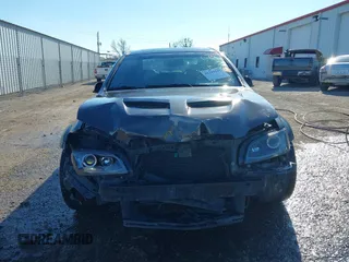 2009 Pontiac G8 GT with VIN 6G2EC57Y79L208207, listed as a IAAI auction lot 41232537 with 180,614 mi miles. Bid and sale history available at carsss.com. Image 13.