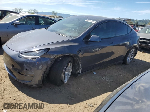 2022 Tesla Model Y Long Range with VIN 7SAYGDEE2NF402320, listed as a Copart auction lot 50396605 with 27,426 mi miles and Salvage Title. Bid and sale history available at DreamBid. Image 1.