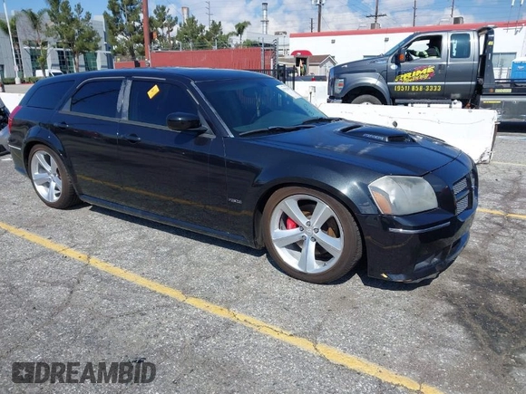 2007 Dodge Magnum SRT-8 with VIN 2D4GV773X7H654618, listed as a IAAI auction lot 41752289 with 103,819 mi miles and . Bid and sale history available at carsss.com. Image 1.
