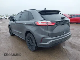 2023 Ford Edge SE z VIN 2FMPK4G95PBA41278, wystawiony jako IAAI lot #41964995 z przebiegiem 21 079 mil mil oraz . Historia ofert i sprzedaży dostępna na DreamBid. Obrazek 3.