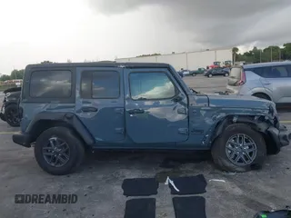 2024 Jeep Wrangler Sport S with VIN 1C4PJXDN8RW370133, listed as a IAAI auction lot 42453029 with 10,415 mi miles and . Bid and sale history available at DreamBid. Image 14.