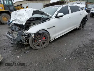 2013 Jaguar XJ Portfolio z VIN SAJWJ2GD6D8V49917, wystawiony jako Copart lot #59896475 z przebiegiem Nie podano mil oraz Szkoda całkowita • Salvage title. Historia ofert i sprzedaży dostępna na DreamBid. Obrazek 1.