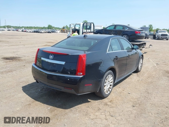 2012 Cadillac CTS z VIN 1G6DC5E52C0142318, wystawiony jako IAAI lot #42413205 z przebiegiem 100 694 mil mil oraz . Historia ofert i sprzedaży dostępna na DreamBid. Obrazek 4.