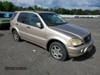 2001 Mercedes-Benz M-Class with VIN 4JGAB72EX1A243970, listed as a Copart auction lot 61308054 with 133,461 mi miles and Salvage Title. Bid and sale history available at carsss.com. Image 4.