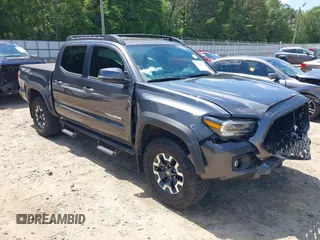 2023 Toyota Tacoma SR z VIN 3TMCZ5AN9PM553246, wystawiony jako IAAI lot #42201812 z przebiegiem 20 907 mil mil oraz . Historia ofert i sprzedaży dostępna na DreamBid. Obrazek 1.