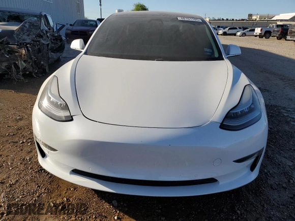 2019 Tesla Model 3 Mid Range z VIN 5YJ3E1EA1KF434552, wystawiony jako Copart lot #48161785 z przebiegiem 57 558 mil mil oraz Tytuł czysty. Historia ofert i sprzedaży dostępna na DreamBid. Obrazek 5.