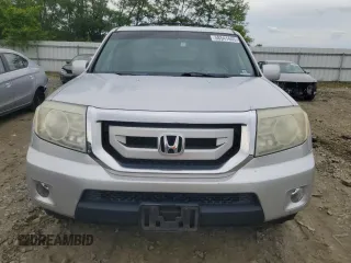 2009 Honda Pilot Touring z VIN 5FNYF48909B012417, wystawiony jako Copart lot #58541445 z przebiegiem 154 387 mil mil oraz Czysty tytuł • Clean title. Historia ofert i sprzedaży dostępna na DreamBid. Obrazek 5.