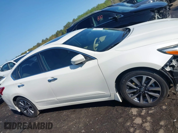 2016 Nissan Altima S z VIN 1N4AL3APXGC202447, wystawiony jako IAAI lot #41923452 z przebiegiem 167 800 mil mil oraz . Historia ofert i sprzedaży dostępna na DreamBid. Obrazek 14.