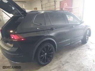 2021 Volkswagen Tiguan SE with VIN 3VV2B7AX1MM012587, listed as a IAAI auction lot 41653479 with 28,158 mi miles. Bid and sale history available at carsss.com. Image 4.