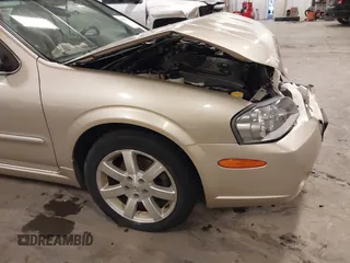 2002 Nissan Maxima GLE z VIN JN1DA31AX2T305310, wystawiony jako IAAI lot #42302521 z przebiegiem 68 920 mil mil oraz . Historia ofert i sprzedaży dostępna na DreamBid. Obrazek 18.