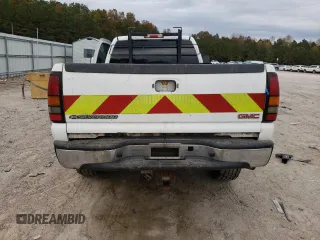 2004 GMC Sierra 1500 with VIN 1GTHC24204E339688, listed as a Copart auction lot 77595054 with 230,719 mi miles and Clean Title. Bid and sale history available at DreamBid. Image 6.