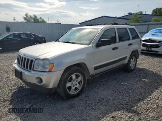 2005 Jeep Grand Cherokee Laredo with VIN 1J4GR48KX5C565762, listed as a Copart auction lot 63080115 with 122,349 mi miles and Salvage title. Bid and sale history available at DreamBid. Image 1.